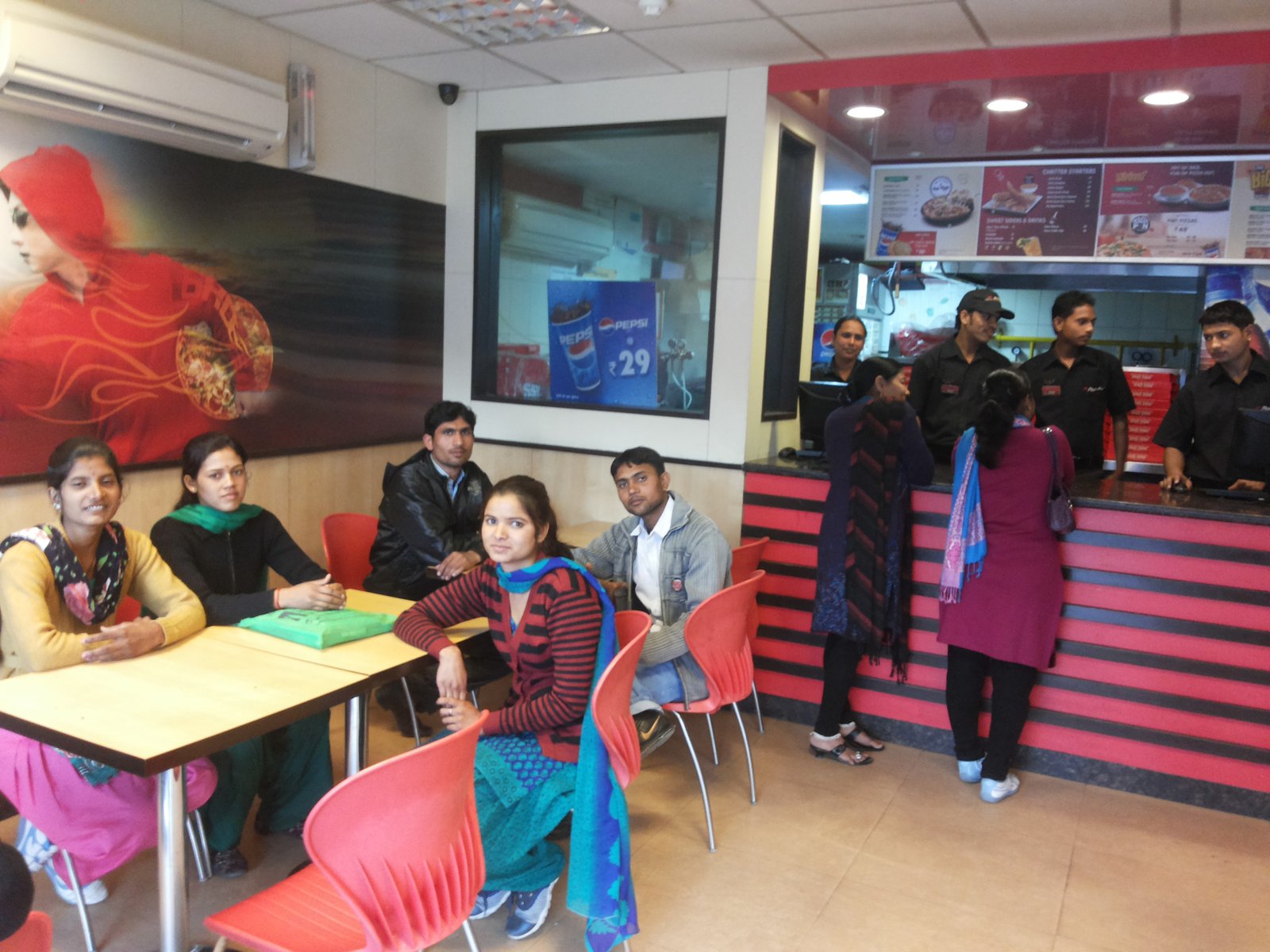 Trainees at a retail outlet after completing a placement linked course